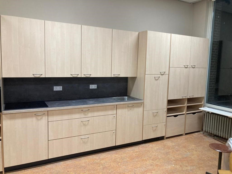 Custom-made cabinet and kitchen wall