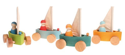 Grimm's 4 wheeled sailboats with figures