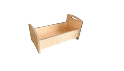 Doll's bed with matching bedding