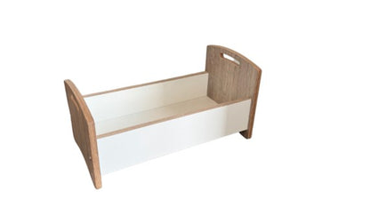 Doll's bed with matching bedding