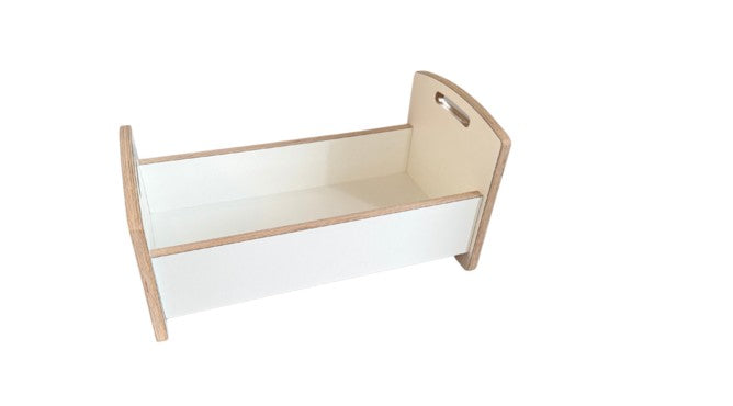 Doll's bed with matching bedding