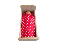 Doll's bed with matching bedding