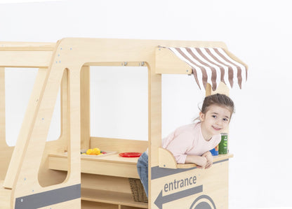 Wooden camper with awning