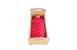 Doll's bed with matching bedding