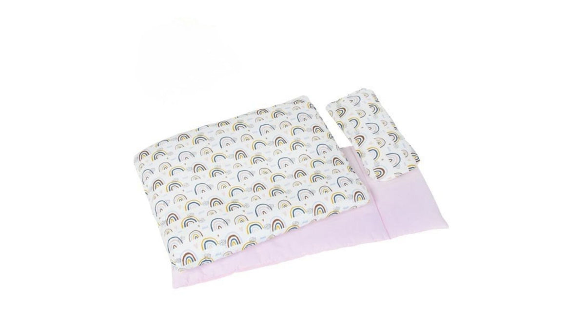 Doll's bed with matching bedding