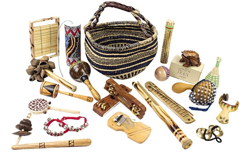Multicultural set with various musical instruments in basket
