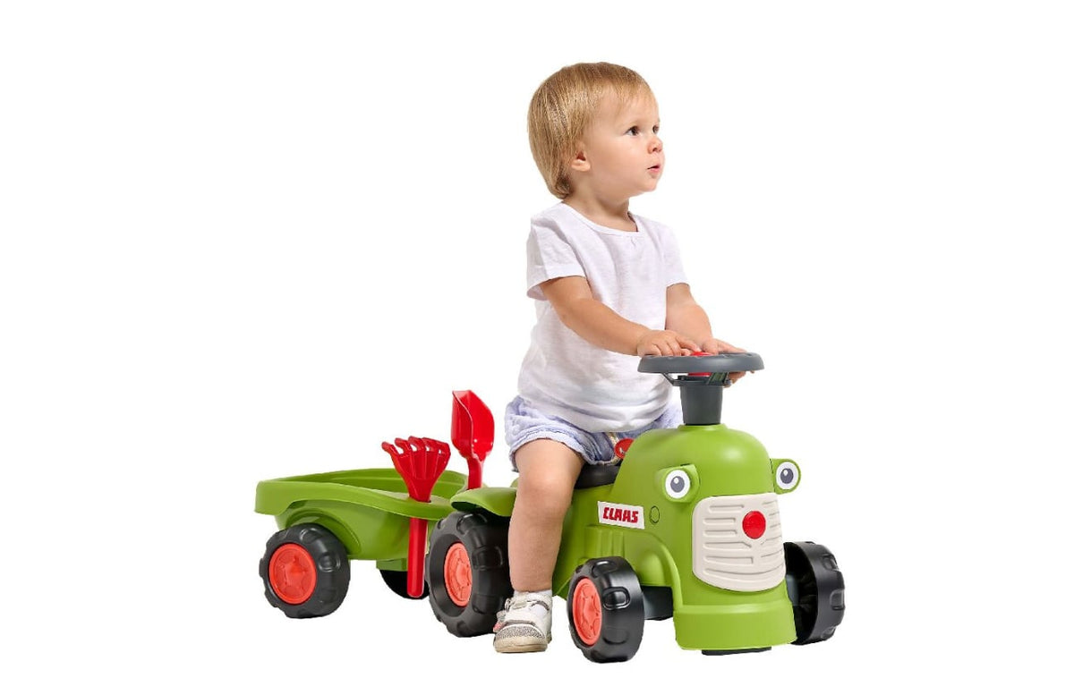 Falk Claas ride-on tractor with trailer and accessories. Vintage model