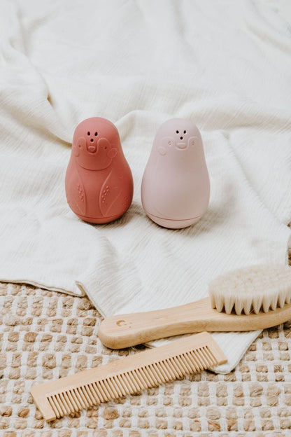 Set of 2 rocking penguins - red/old pink
